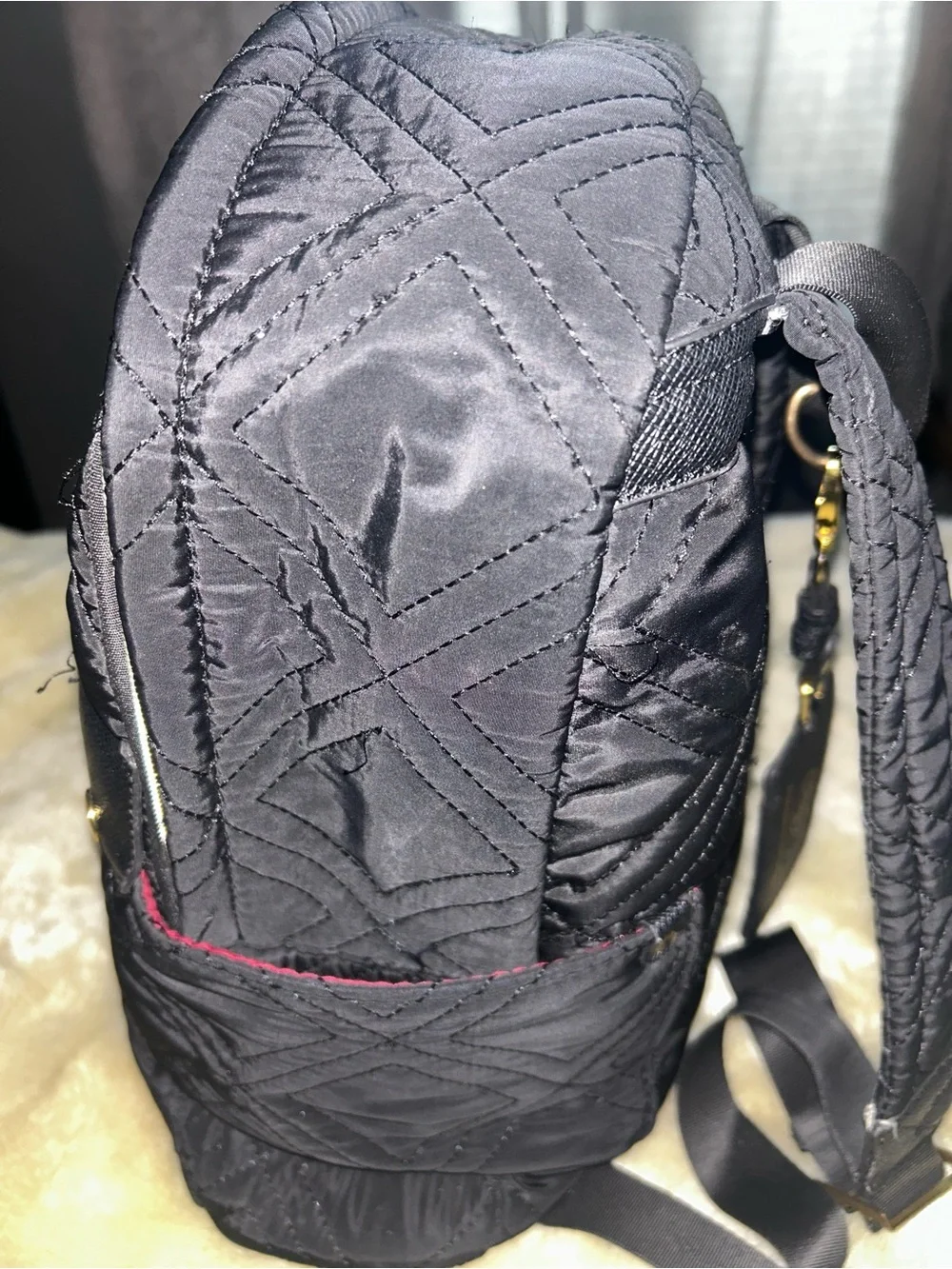 Adrienne Vittadini Black Quilted Backpack with Gold Accents